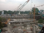 The plot is presently being used as a temporary public parking facility by the civic body. (HT)