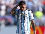 Enzo Fernandez of Argentina reacts as he walks off the pitch after receiving a red card.