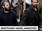 3 days after walking Capitol hill, the Tate brothers were in handcuffs, why?