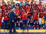 Rodri of Spain talks with US President Donald Trump after being presented the FIFA World Cup Winners Trophy as they celebrate the World Cup champions following the FIFA World Cup 2026 Final.