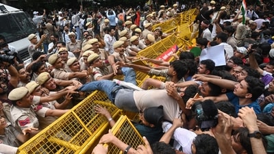 Supporters of the Cockroach Janta Party scuffle with police as they attempt to march toward India's Parliament, demanding the resignation of the education minister, in New Delhi, Monday, July 20, 2026. (AP Photo/Vipin) Supporters of the Cockroach Janta Party scuffle with police as they attempt to march toward India's Parliament, demanding the resignation of the education minister, in New Delhi, Monday, July 20, 2026. (AP Photo/Vipin)