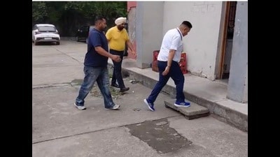 Gurinderjit Singh Nagra being taken to a court in Dasuya, Hoshiarpur, on Tuesday. Gurinderjit Singh Nagra being taken to a court in Dasuya, Hoshiarpur, on Tuesday.