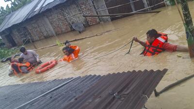 NDRF officials conduct a rescue operation in a flood-affected area in Assam. (X)