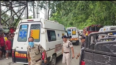 Police personnel at the site as a rescue operation is underway after 27 workers were trapped in a tunnel under construction following a landslide in Gangtok, Sikkim, Tuesday, July 21, 2026. (PTI) Police personnel at the site as a rescue operation is underway after 27 workers were trapped in a tunnel under construction following a landslide in Gangtok, Sikkim, Tuesday, July 21, 2026. (PTI)