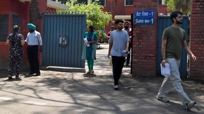 Candidates leave the examination center. (HT photo) Candidates leave the examination center. (HT photo)