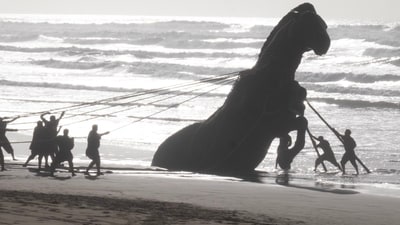 Christopher Nolan’s version of the Trojan Horse—35 feet tall and rearing on hind legs—was half buried in sand on the Atlantic coast. Christopher Nolan’s version of the Trojan Horse—35 feet tall and rearing on hind legs—was half buried in sand on the Atlantic coast.
