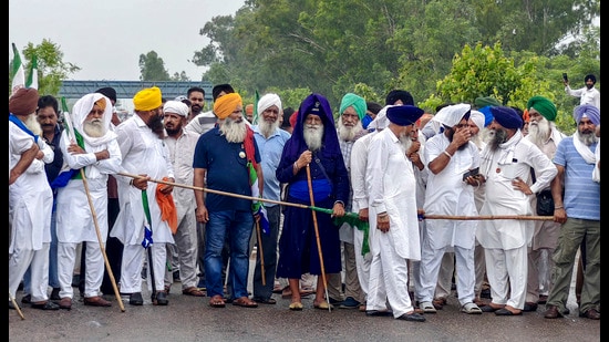 A large number of farmers from Ambala and Kurukshetra who attempted to reach Delhi were detained by the police at various locations in Kurukshetra. (PTI)
