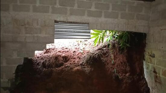 A portion of a rain-soaked hillside collapsed onto the residence of Stolin Khymdeit. (HT Sourced Photo)