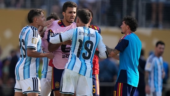 Nicolas Otamendi and Nahuel Molina scuffle with Spain’s Rodrigo after the World Cup final.