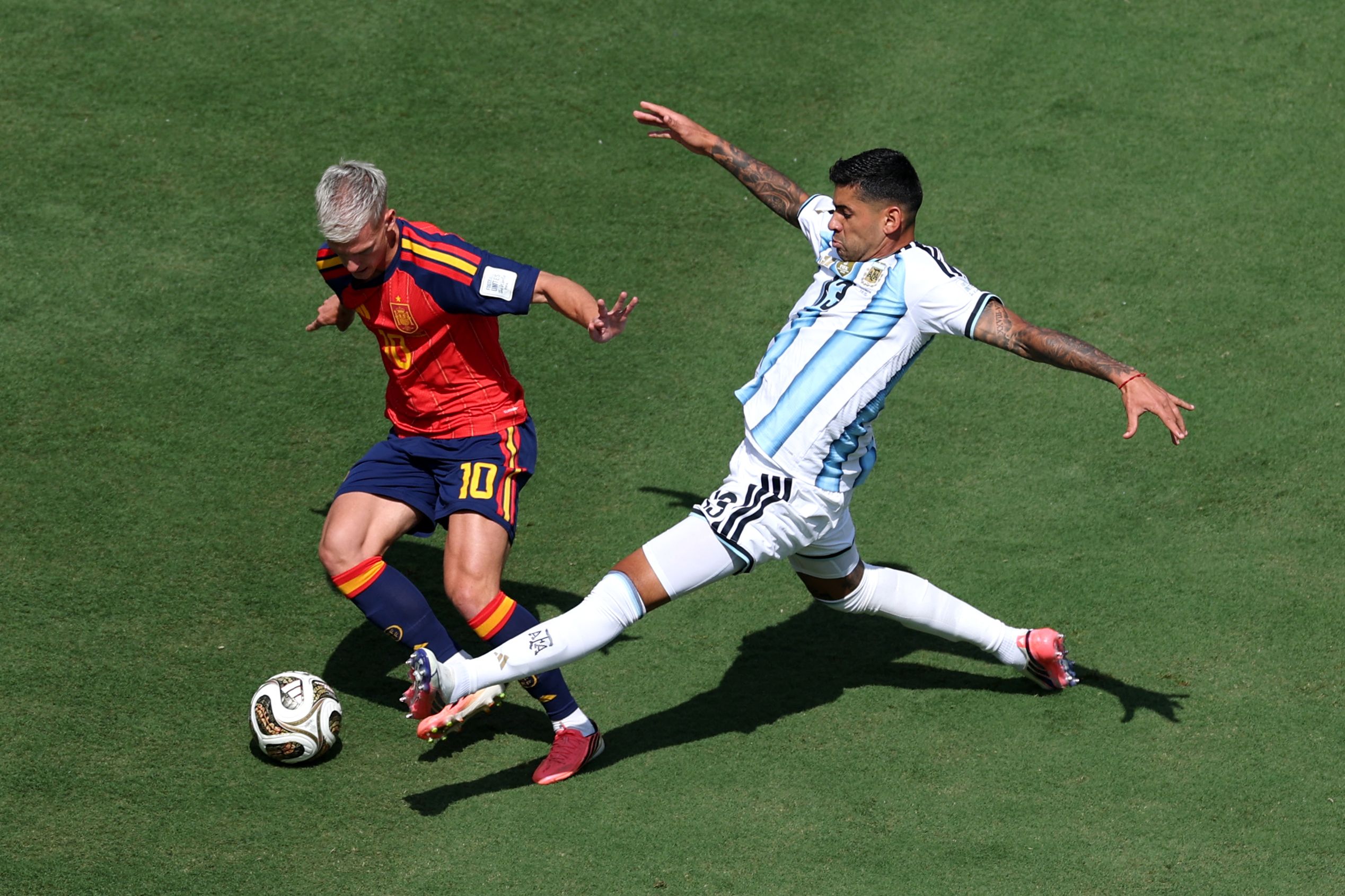 Dani Olmo #10 of Spain controls the ball against Cristian Romero #13 of Argentina during the FIFA World Cup 2026 Final match (Getty Images via AFP) Dani Olmo #10 of Spain controls the ball against Cristian Romero #13 of Argentina during the FIFA World Cup 2026 Final match (Getty Images via AFP)