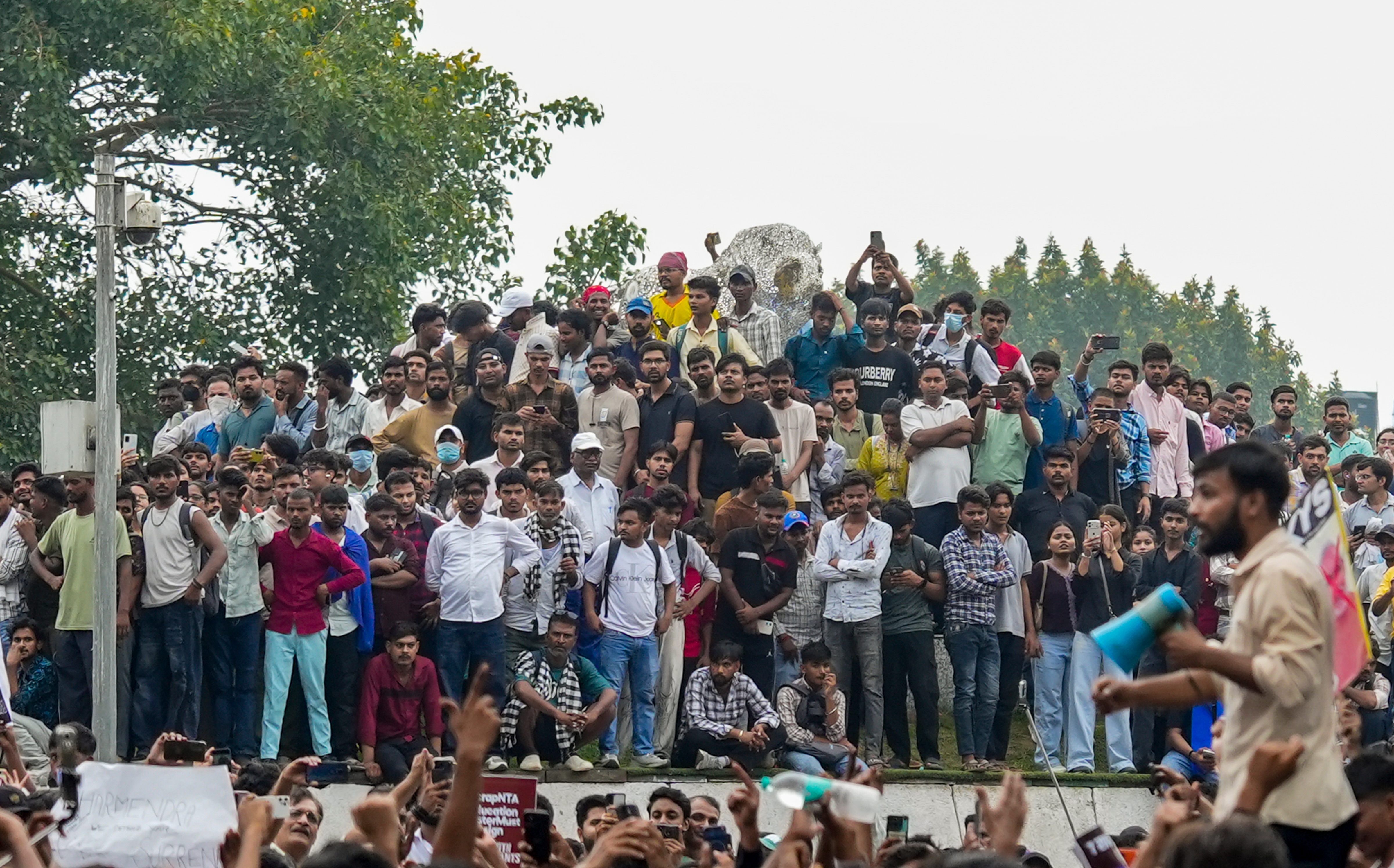 Cockroach Janata Party (CJP) supporters gather during a protest march, at Connaught Place, in New Delhi, Monday, July 20, 2026. Delhi Police is on high alert ahead of the Monsoon Session of Parliament and CJP's proposed "Chalo Sansad" march on Monday. (PTI)