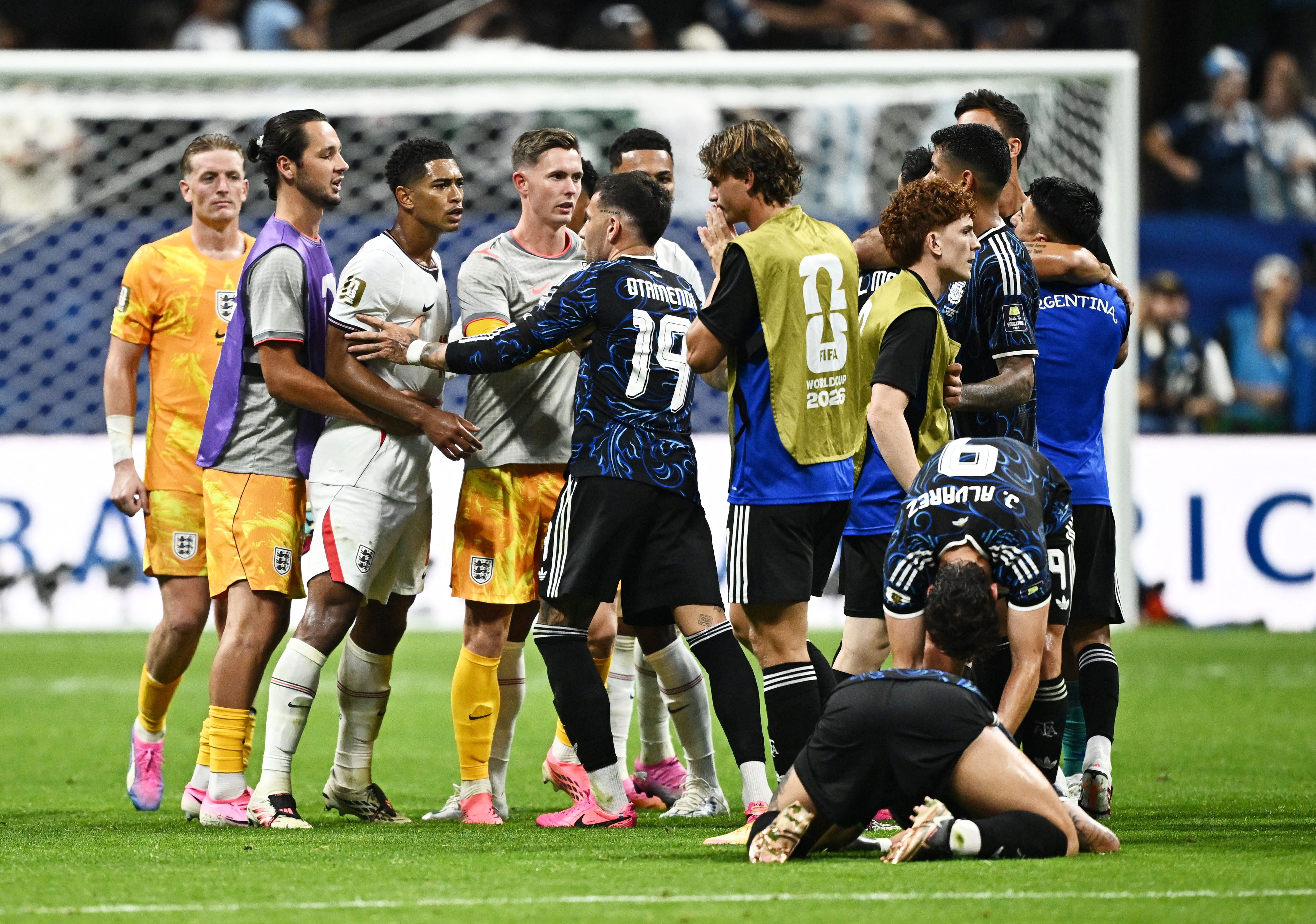 Argentina's Nicolas Otamendi clashes with England's Jude Bellingham at the end of the match (REUTERS)
