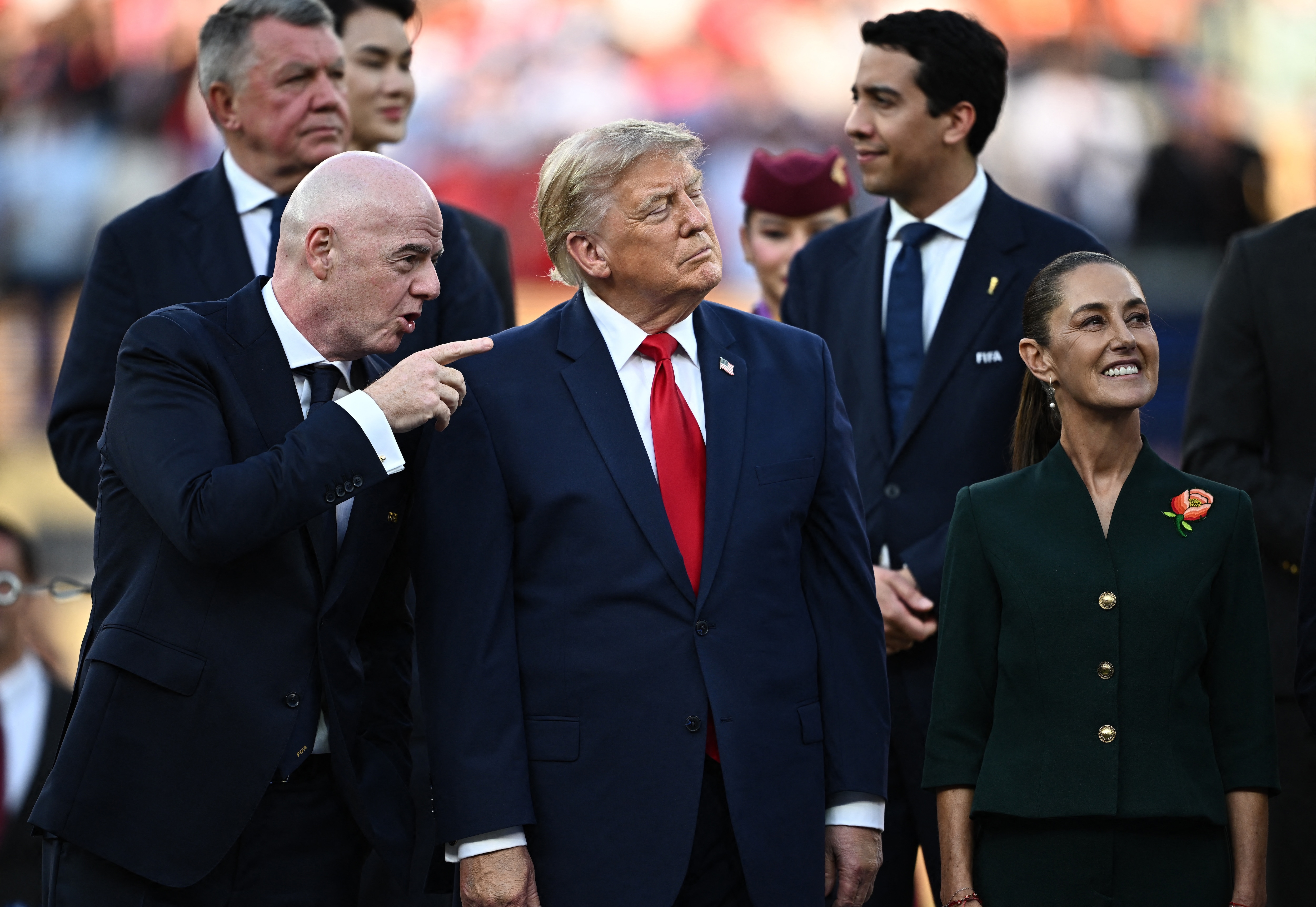 US President Donald Trump, FIFA President Gianni Infantino and Mexico President Claudia Sheinbaum during the trophy presentation after the match REUTERS/Dylan Martinez