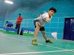 A player in action during the district badminton championship at Shastri Badminton Hall in Ludhiana on Tuesday. (Manish/HT)