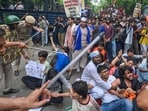 Security personnel carry out Lathi charge during CJP protest March to near the Parliament House, in New Delhi. 