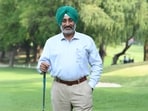 Chandigarh Golf Club president Major RS Virk (retd) striking a pose at the 10th hole on the sprawling green course. (Keshav Singh/HT)