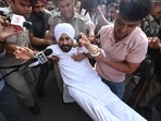 Congress’ Jalandhar MP and former Punjab chief minister Charanjit Singh Channi being detained by the Delhi Police on Tuesday. (RAJ K RAJ /HT PHOTO)