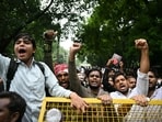Cockroach Janta Party (CJP) supporters shout slogans at Jantar Mantar in New Delhi.