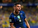 Brazil's Casemiro (5) celebrates his side's second goal by Matheus Cunha (9) during the World Cup Group C soccer match between Brazil and Haiti in Philadelphia, Friday, June 19.