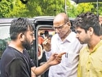 NCP (SP) president Sharad Pawar interacts with Cockroach Janata Party (CJP) founder Abhijeet Dipke at Jantar Mantar. (PTI)