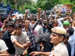New Delhi: Commuters stage a protest outside Janpath metro station as it is being closed due to 'security reasons', in New Delhi, Wednesday, July 22, 2026. Sixteen Delhi Metro stations, including Rajiv Chowk, Central Secretariat, Mandi House, ITO and Khan Market, were closed amid the ongoing Cockroach Janta Party (CJP) protest at Jantar Mantar. (PTI Photo/Salman Ali)(PTI07_22_2026_000115B)