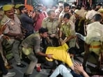 Police detained Samajwadi Party workers protesting in Lucknow on Tuesday. (HT)