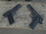 The seized firearms.