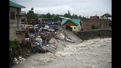 A view of the damaged shopping complex after it was washed away following continuous heavy rainfall at Beerwah in Budgam district some 3O kms from Srinagar, on Wednesday. (Waseem Andrabi/HT) A view of the damaged shopping complex after it was washed away following continuous heavy rainfall at Beerwah in Budgam district some 3O kms from Srinagar, on Wednesday. (Waseem Andrabi/HT)