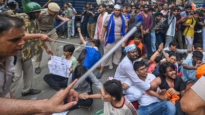 Security personnel carry out a lathi charge during a CJP protest march near the Parliament building in New Delhi. (Raj K Raj / Hindustan Times) Security personnel carry out a lathi charge during a CJP protest march near the Parliament building in New Delhi. (Raj K Raj / Hindustan Times)