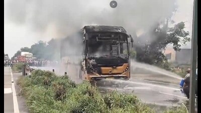 Firefighters try to douse the flames near Kauntarpur village in Pathankot. (Sourced)