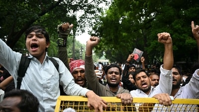 Cockroach Janta Party (CJP) supporters shout slogans at Jantar Mantar in New Delhi. (AFP)