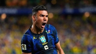 Brazil's Casemiro (5) celebrates his side's second goal by Matheus Cunha (9) during the World Cup Group C soccer match between Brazil and Haiti in Philadelphia, Friday, June 19. (AP Photo/Petr David Josek)