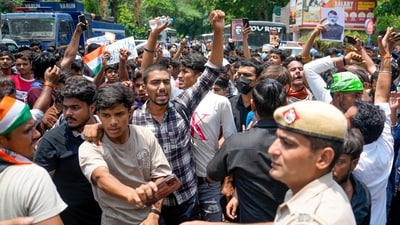 New Delhi: Commuters stage a protest outside Janpath metro station as it is being closed due to 'security reasons', in New Delhi, Wednesday, July 22, 2026. Sixteen Delhi Metro stations, including Rajiv Chowk, Central Secretariat, Mandi House, ITO and Khan Market, were closed amid the ongoing Cockroach Janta Party (CJP) protest at Jantar Mantar. (PTI Photo/Salman Ali)(PTI07_22_2026_000115B) New Delhi: Commuters stage a protest outside Janpath metro station as it is being closed due to 'security reasons', in New Delhi, Wednesday, July 22, 2026. Sixteen Delhi Metro stations, including Rajiv Chowk, Central Secretariat, Mandi House, ITO and Khan Market, were closed amid the ongoing Cockroach Janta Party (CJP) protest at Jantar Mantar. (PTI Photo/Salman Ali)(PTI07_22_2026_000115B)