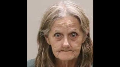 Who is Gail Giustino? Martin County postal worker, 77, arrested for hoarding 80 cats, 12 dogs she collected along route (Martin County Sheriff's Office) Who is Gail Giustino? Martin County postal worker, 77, arrested for hoarding 80 cats, 12 dogs she collected along route (Martin County Sheriff's Office)