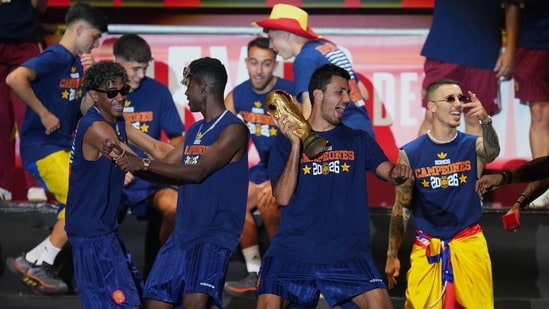 Players from Spain's national soccer team perform for fans at Cibeles Square in Madrid on Monday, July 20, 2026, after Spain defeated Argentina in the World Cup final