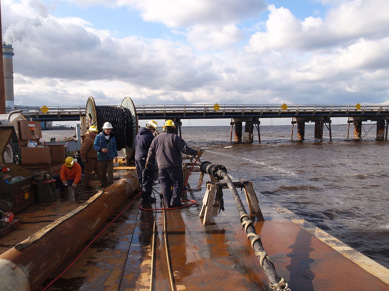An undersea cable being repaired (Wikimedia Commons)