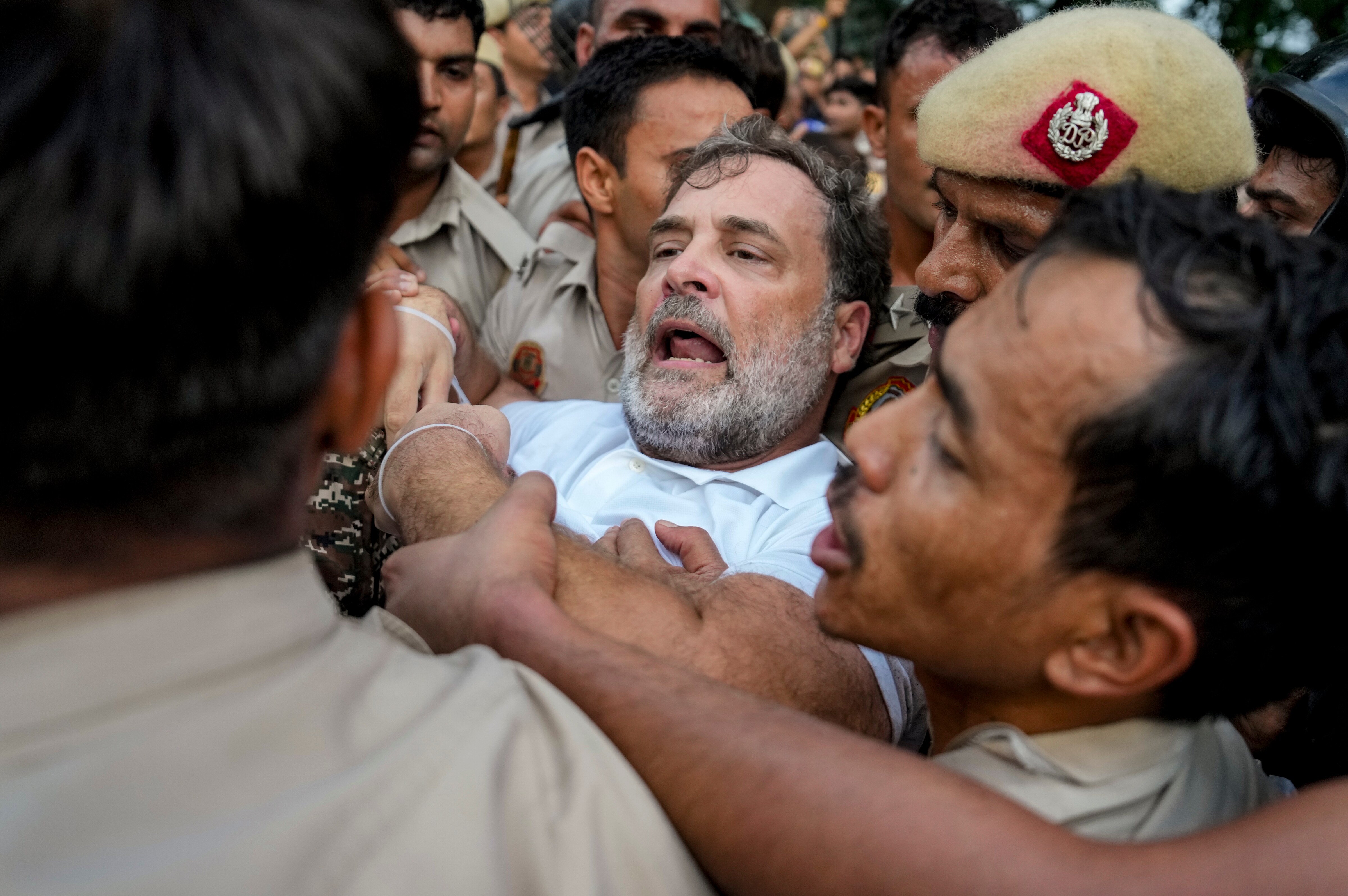 Security personnel detain Leader of Opposition in the Lok Sabha Rahul Gandhi during a sit-in protest near the Prime Minister's residence over alleged irregularities in the NEET examination. (PTI) Security personnel detain Leader of Opposition in the Lok Sabha Rahul Gandhi during a sit-in protest near the Prime Minister's residence over alleged irregularities in the NEET examination. (PTI)