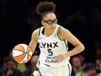 Olivia Miles brings her season totals to 503 points and 155 assists through 26 games.(Getty Images via AFP)