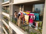 Mumbai real estate: Across several premium residential developments, from Worli and Bandra to Powai and Lower Parel, housing societies have introduced rules prohibiting residents from drying clothes or towels in balconies or outside windows. (Picture for representational purposes only)