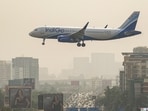 **EDS: FILE IMAGE** Flying into the red, IndiGo on Friday, May 29, 2026, reported a loss of  <span class='webrupee'>₹</span>2,536.9 crore in the March quarter due to multiple headwinds, including challenging operating conditions and rupee depreciation. An IndiGo aircraft prepares to land at the airport, in Mumbai, in this file photo dated Saturday, Dec. 6, 2025. (PTI Photo/Kunal Patil) (PTI05_29_2026_000183A)
