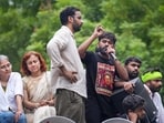 Cockroach Janata Party (CJP) founder Abhijeet Dipke speaks following a protest demanding the resignation of Union Education Minister Dharmendra Pradhan.