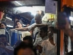Lok Sabha LoP Rahul Gandhi and opposition MPs board a bus and head towards Gandhi Smriti, in New Delhi, Thursday.