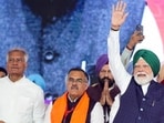 Prime Minister Narendra Modi waves to the crowd during a public meeting in Jalandhar.