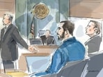 In this courtroom sketch, Assistant U.S. Attorney Timothy Lynch, left, gestures toward defendant Hadi Matar, foreground, during opening remarks in Matar's terrorism trial for his alleged attack on Salman Rushdie, Wednesday, July 22, 2026, in federal court in Buffalo, N.Y.