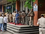 Heavy police deployment outside closed exit of Patel Chowk metro station, in Delhi on Wednesday. 