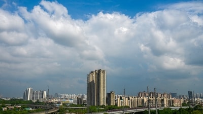 Gram it: It’s monsoon in Delhi, and the city’s skyline is putting on a spectacular show. Following recent rainfall, air pollution levels have dropped significantly over the past few days, drastically improving visibility. The result is clear blue skies across several parts of the NCR, including this view from Noida. As per the India Meteorological Department (IMD), residents can expect cloudy skies over the next six days. (Photo: Sunil Ghosh/HT)