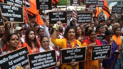 There is widespread confusion across Maharashtra regarding the installation of electricity smart meters, and many citizens are opposing the project. Against this backdrop, workers of the Maharashtra Navnirman Sena (MNS) staged a protest On Wednesday outside the MSEB ( Mahavitaran ) Divisional office at Wagle Estate in Thane. During the demonstration, the protesters raised slogans demanding that smart meters should not be imposed on consumers and expressed their strong opposition to the installation of electricity smart meters ,in Thane ,in Mumbai, India, on, Wednesday, July -22, 2026. ( photo by&nbsp; (Praful Gangurde/Hindustan Times)