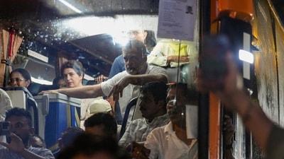 Lok Sabha LoP Rahul Gandhi and opposition MPs board a bus and head towards Gandhi Smriti, in New Delhi, Thursday. (PTI) Lok Sabha LoP Rahul Gandhi and opposition MPs board a bus and head towards Gandhi Smriti, in New Delhi, Thursday. (PTI)