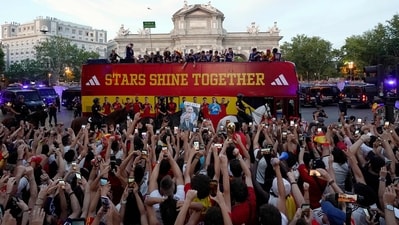 Spain's players' victory parade on an open-top bus in Madrid on Monday. (AFP) Spain's players' victory parade on an open-top bus in Madrid on Monday. (AFP)