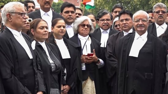 Advocates gather on the Supreme Court premises to read the Preamble to the Constitution in solidarity with protesting students and against the alleged police action at Jantar Mantar.